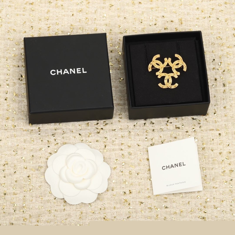 Ch*el brooches